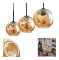 Luminaire Noir et Ambre a silhouette graphique de type suspension 15 W IP20 E27