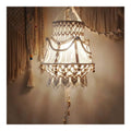 Luminaire Ambre et Beige a silhouette graphique de type lustre